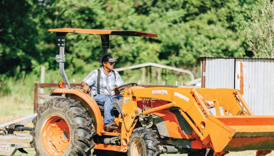 featured image of farmer on a tractor.
